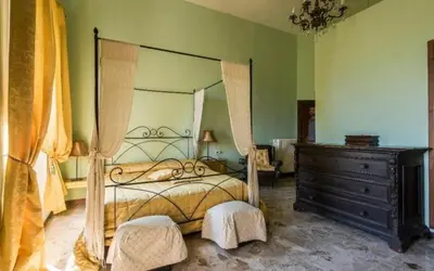 Letto o letti in una camera di Villa Del Mosaico