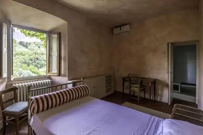 Letto o letti in una camera di Villa Legacy