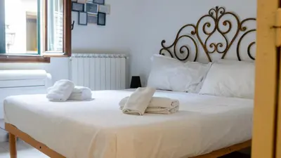 Letto o letti in una camera di Little Sweet Home in Florence