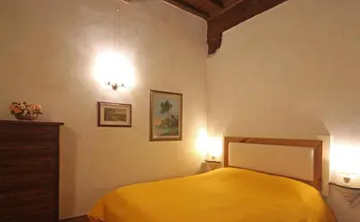 Letto o letti in una camera di Verrazzano Apartment