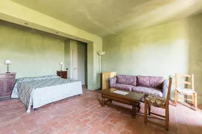Letto o letti in una camera di I Casali del Trebbiolo