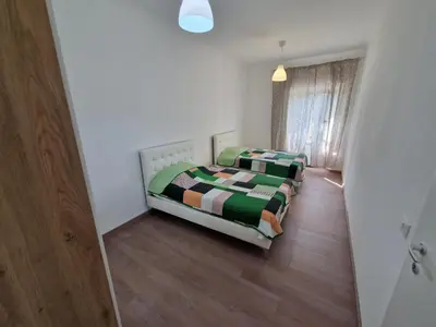 Letto o letti in una camera di Appartamento Achille