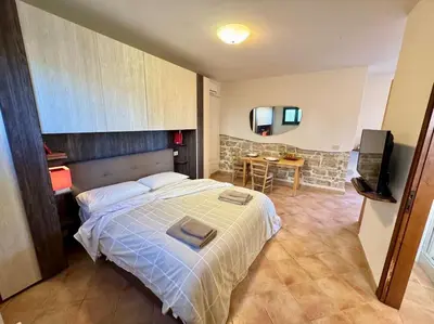 Letto o letti in una camera di Tra il Centro Storico di Firenze e il Chianti