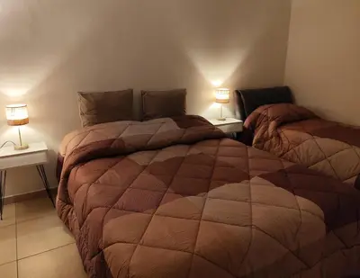 Letto o letti in una camera di Sweet Home Pilastri