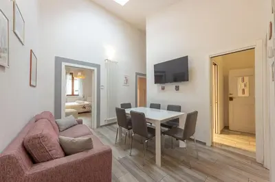 TV o dispositivi per l'intrattenimento presso San Remigio 4 Bedrooms Apartment