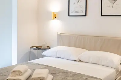 Letto o letti in una camera di San Gallo Luxury 2 minuti dal Duomo