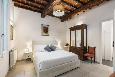 Letto o letti in una camera di Roped Rooms Florence