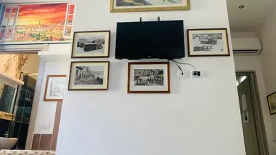 TV o dispositivi per l'intrattenimento presso Guest House Biffi Simone