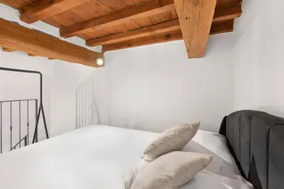 Letto o letti in una camera di B&B Essevu Loft Borgo Pinti