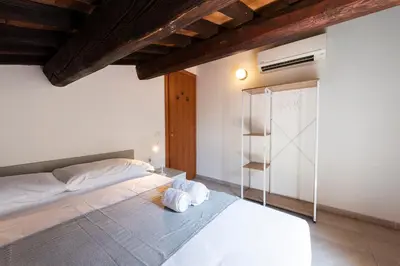 Letto o letti in una camera di The Luxor Suites - Corsica