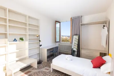 Letto o letti in una camera di Panoramic Home 5 min ponte vecchio and center