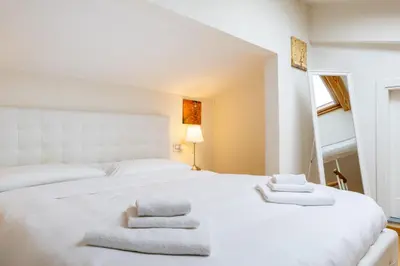 Letto o letti in una camera di San Frediano Panoramic Terrace