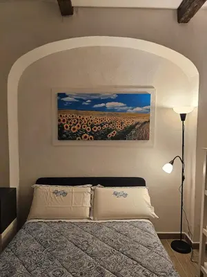 Letto o letti in una camera di Stanza Centrale a Firenze - Rodolfo