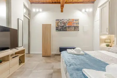Letto o letti in una camera di Santa Croce Suite Centro di Firenze, 9 min Duomo