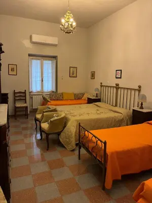Letto o letti in una camera di Apartment in villa Il Castellaccio