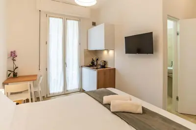 Letto o letti in una camera di Casa Eleonora