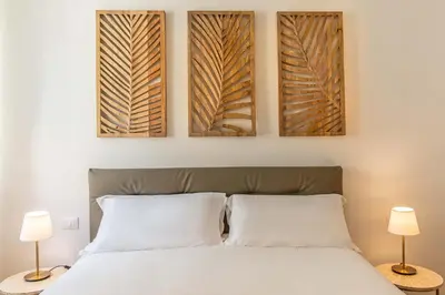 Letto o letti in una camera di Casa Eleonora