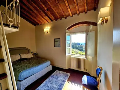 Letto o letti in una camera di Casa Orchidea