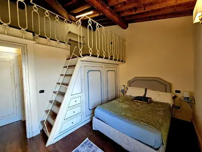 Letto o letti in una camera di Casa Orchidea