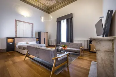 Letto o letti in una camera di La Torre del Cestello - Residenza d'epoca