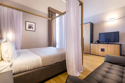 Letto o letti in una camera di La Torre del Cestello - Residenza d'epoca