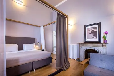Letto o letti in una camera di La Torre del Cestello - Residenza d'epoca
