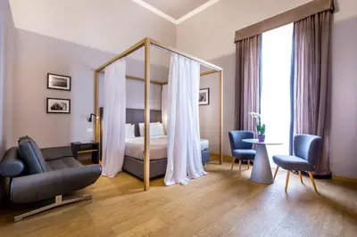Letto o letti in una camera di La Torre del Cestello - Residenza d'epoca