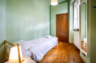 Letto o letti in una camera di YD Amaryllis