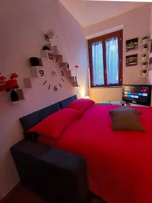 Letto o letti in una camera di Apt tra arte e natura ingresso indipendente