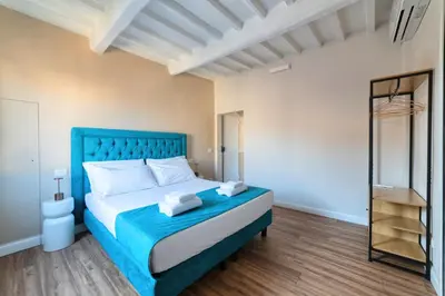 Letto o letti in una camera di NiNNi 12 Apt