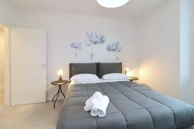 Letto o letti in una camera di Suite Rose