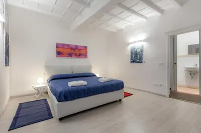 Letto o letti in una camera di Friends Of Florence