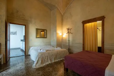 Letto o letti in una camera di Studio Bargello