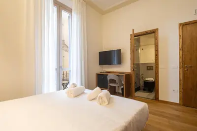 Letto o letti in una camera di Ars Nova Apartments
