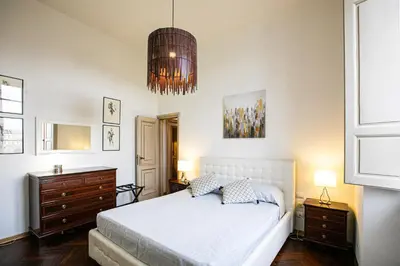 Letto o letti in una camera di Apartment San Niccolò Unique view and location