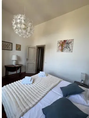 Letto o letti in una camera di Apartment San Niccolò Unique view and location