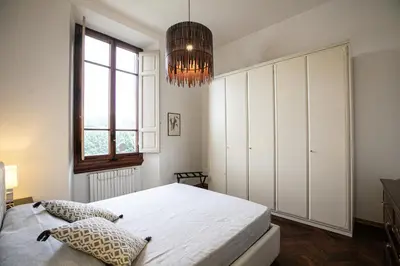 Letto o letti in una camera di Apartment San Niccolò Unique view and location