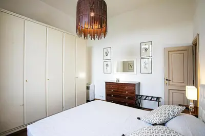 Letto o letti in una camera di Apartment San Niccolò Unique view and location
