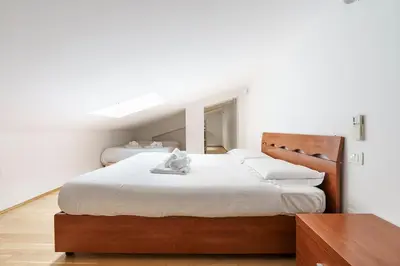 Letto o letti in una camera di Window on the Arno II Netflix, WiFi, AC