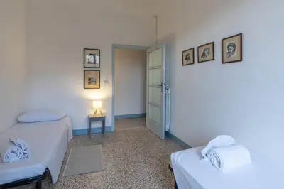 Letto o letti in una camera di Suite Santa Croce