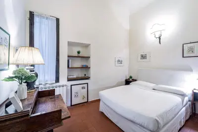 Letto o letti in una camera di UNYCA - Florence Central 2 Bedroom Apartment