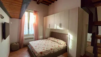 Letto o letti in una camera di Casetta nel centro di Sesto Fiorentino