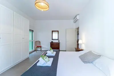 Letto o letti in una camera di UNYCA - Bright Florence Apartment