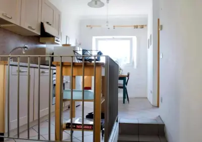Cucina o angolo cottura di UNYCA - Florence cozy 3 bedroom Apartment 2