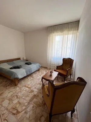 Letto o letti in una camera di Ampio appartamento 6 posti con aria condizionata e balconi