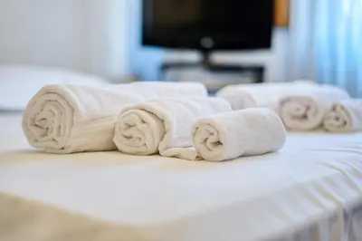 Letto o letti in una camera di Maggio - Boutique Home in Florence