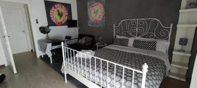 Letto o letti in una camera di Giulietta Rooms