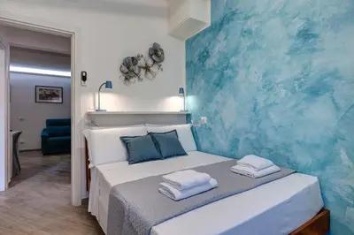 Letto o letti in una camera di Barnaba Apartment by Mamo Florence