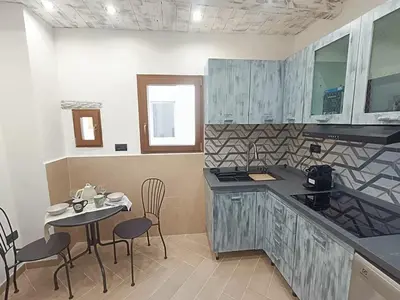 Cucina o angolo cottura di BNB Frescoes Rooms San Frediano