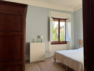 Letto o letti in una camera di San Frediano Sunset Apartment